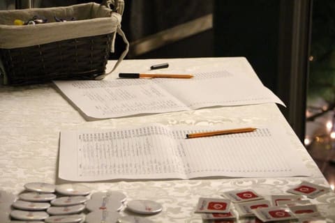 The registration table with sign-up sheets and pencils
